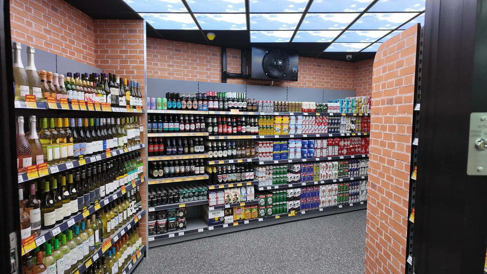 Inside the beer cave at Aria/s Hub, Bridgend — floor-to-ceiling chilled drinks